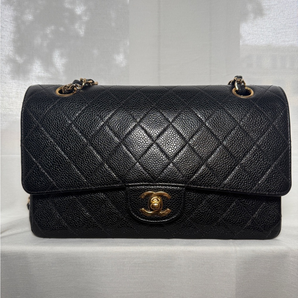 Chanel medium classic flap caviar black gold